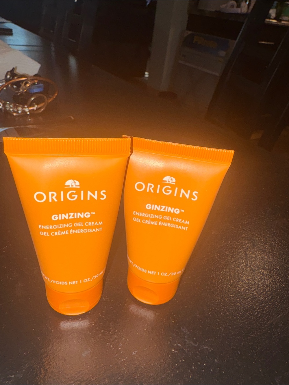 Origins GinZing Energizing Gel Cream - bright orange tubes